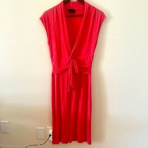 Coral figure flattering sleeveless dress very sexy low v at breast